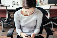 11 Desk Yoga Moves to Relieve Neck, Back, and Shoulder Tension