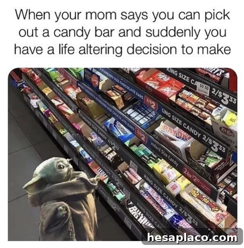 Baby Yoda picking out candy