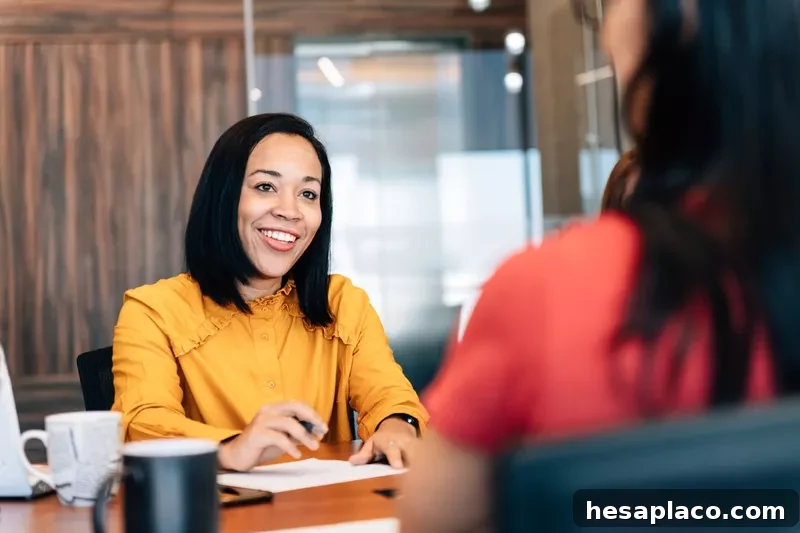 Woman talking at a desk