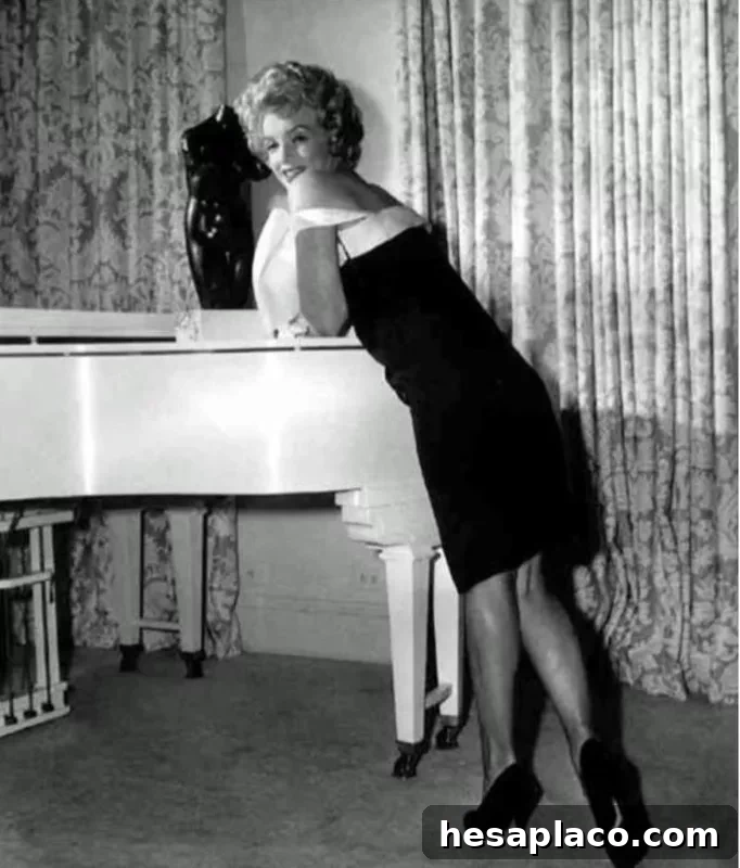 Marilyn Monroe at her Baby Grand Piano