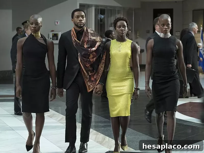 Florence Kasumba, Chadwick Boseman, Danai Gurira, and Lupita Nyong'o in Black Panther (2018)