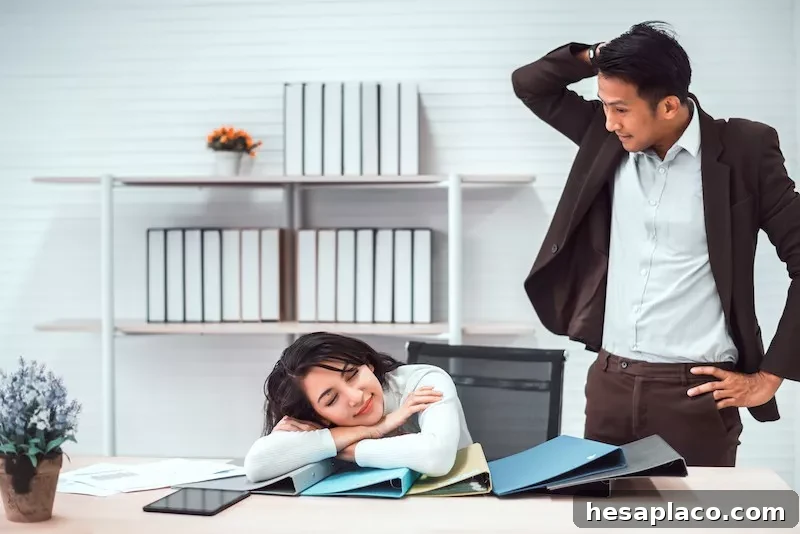 Woman sleeping at work