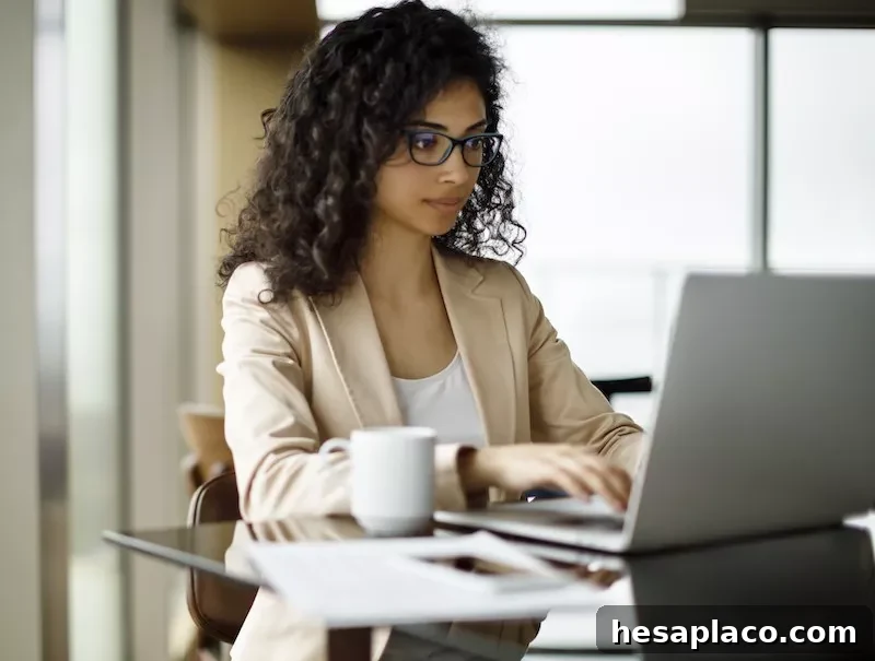 Businesswoman emailing