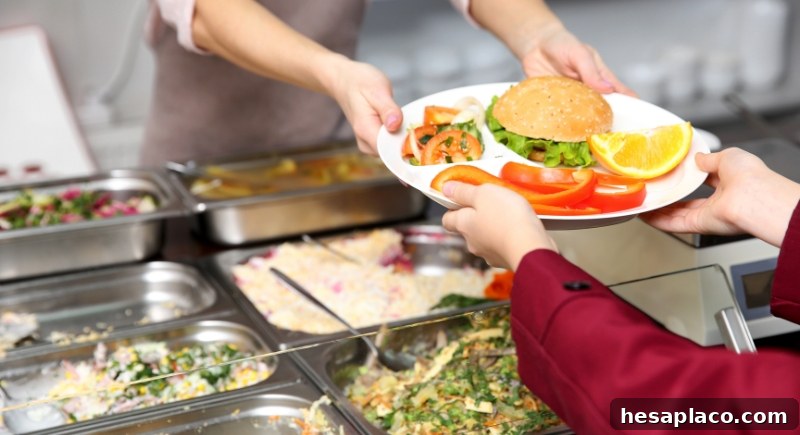Children lining up for school cafeteria food