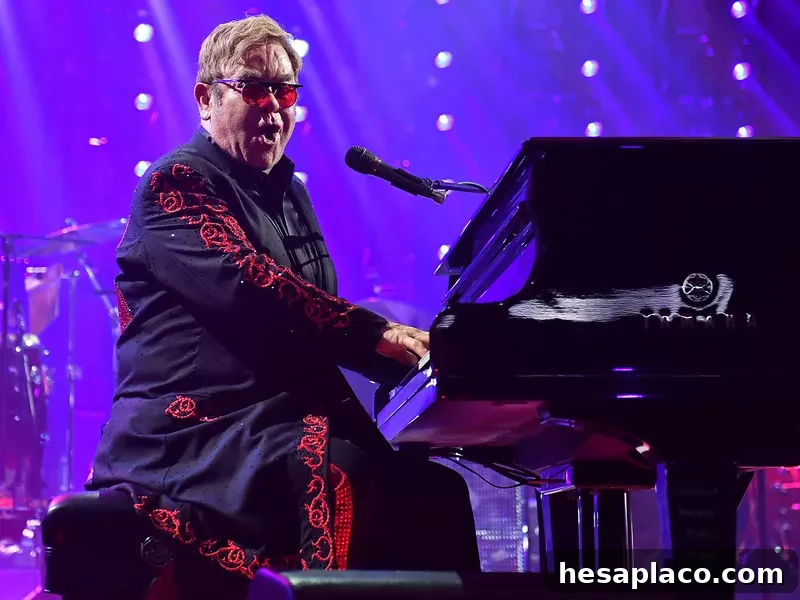 Elton John performing
