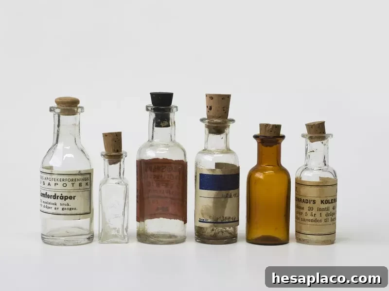 Group of small vintage translucent medicine bottles