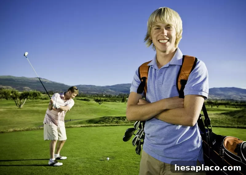 Golfer with caddy