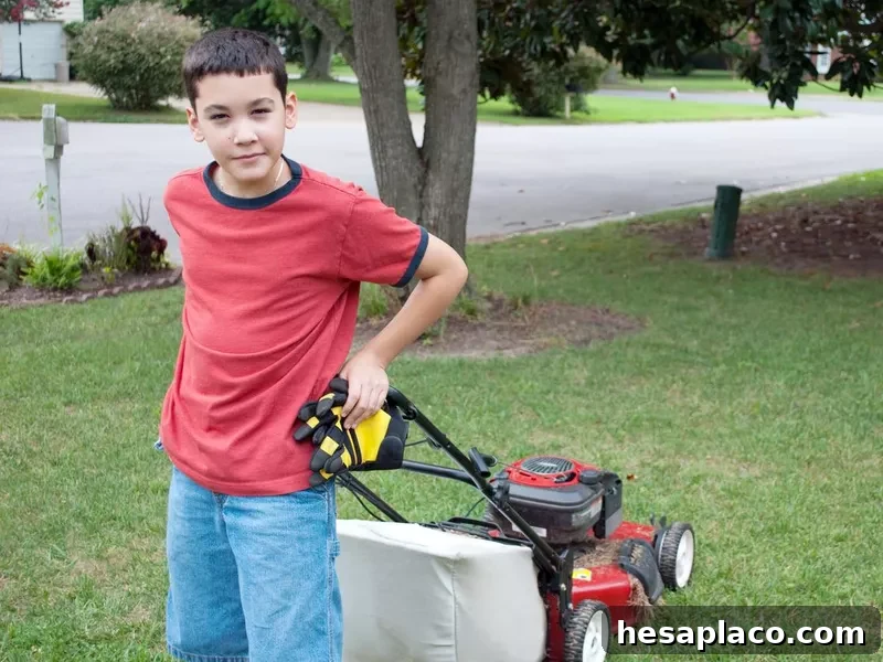 Kid mowing the lawn