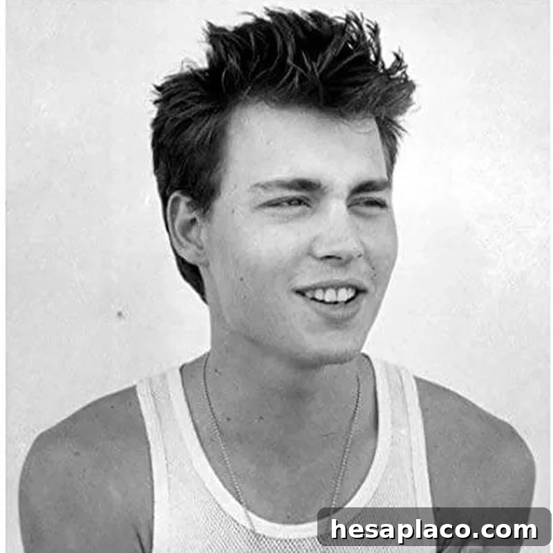 Young Johnny Depp smiling