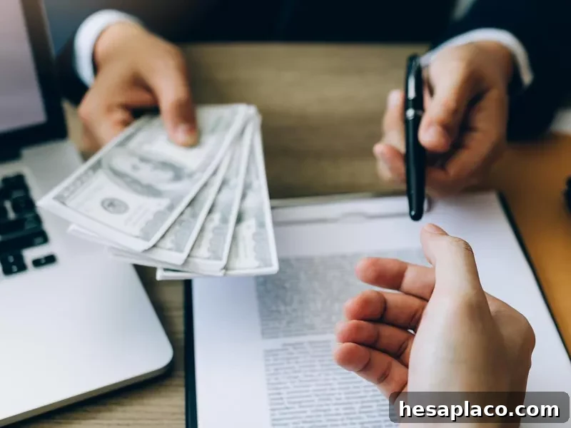 Handing someone money to start a job