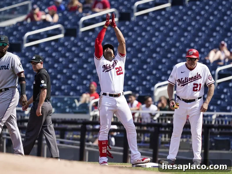 Washington Nationals' Juan Soto celebrates his single