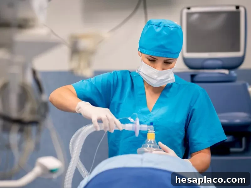 Nurse putting oxygen mask to patient during surgery